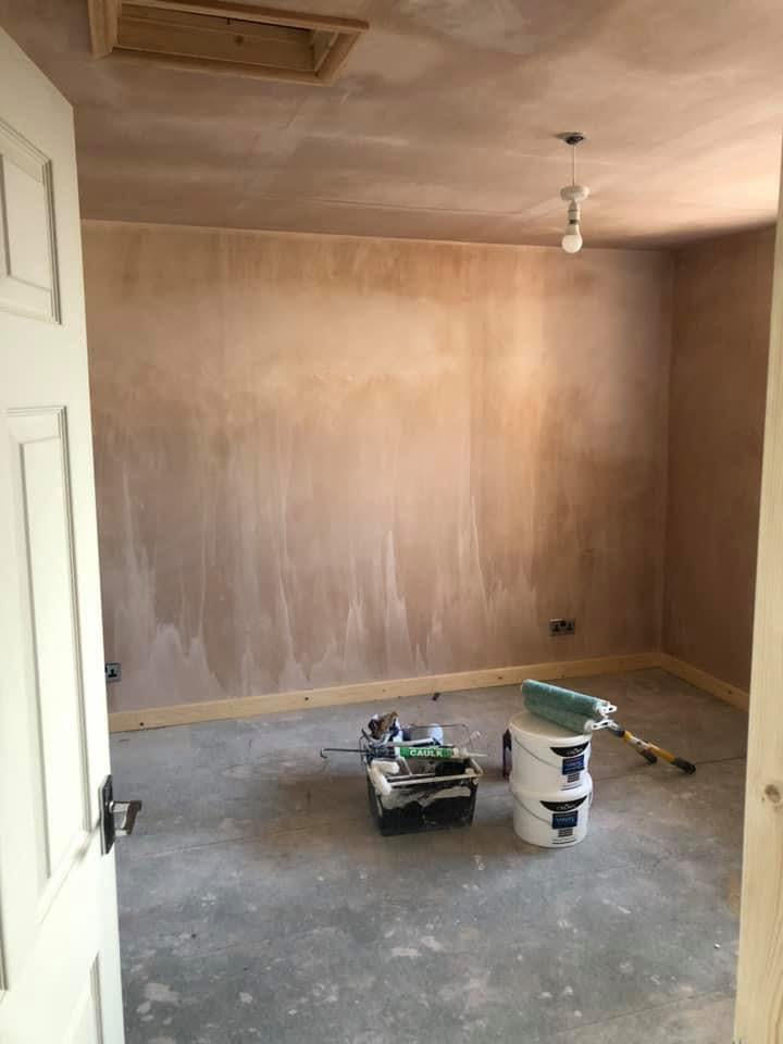 Mauve feature wall, before decorating